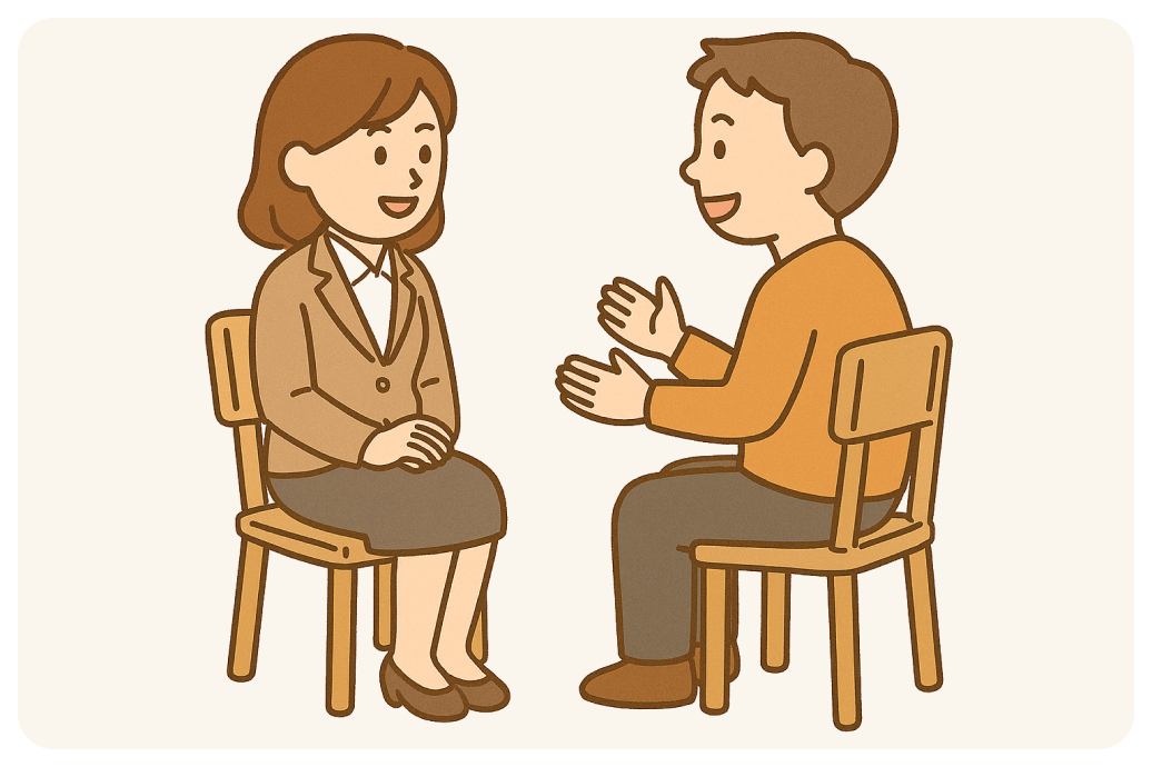 兩個人坐在椅子上聊天的圖示